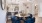 a dining room with blue chairs