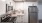 a kitchen with white cabinets