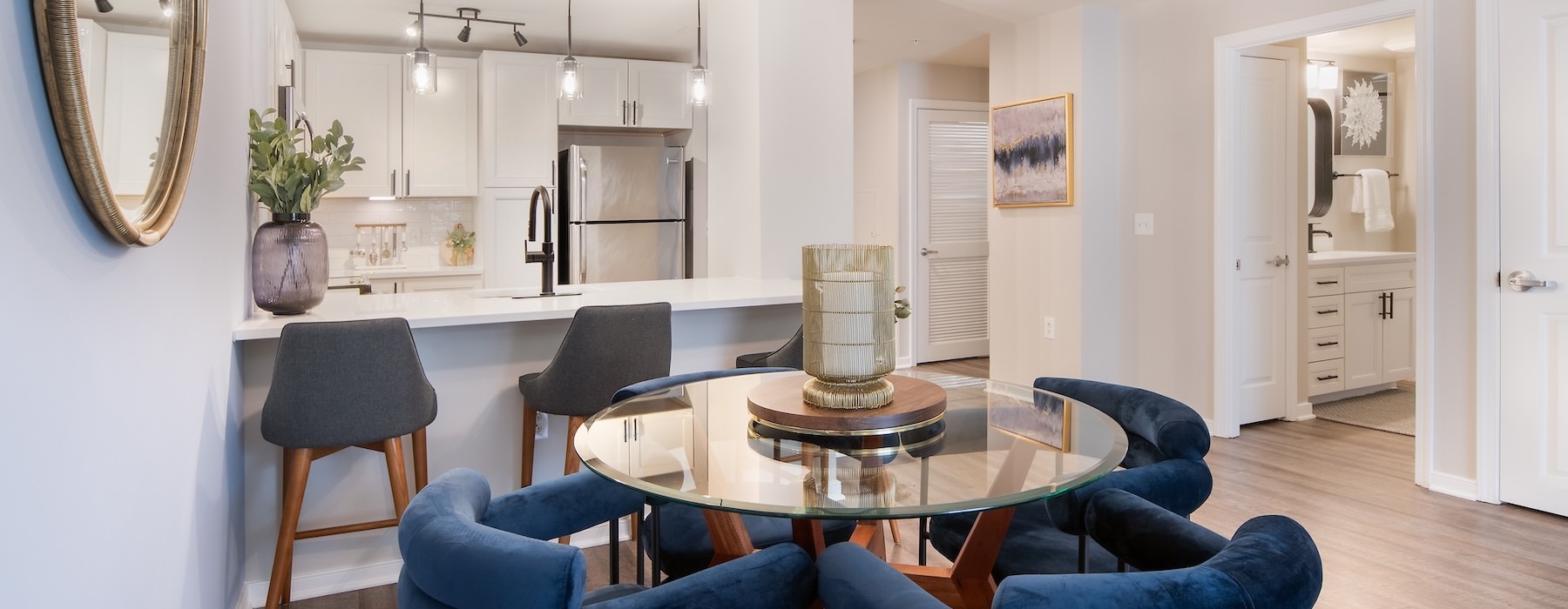 a dining room with blue chairs