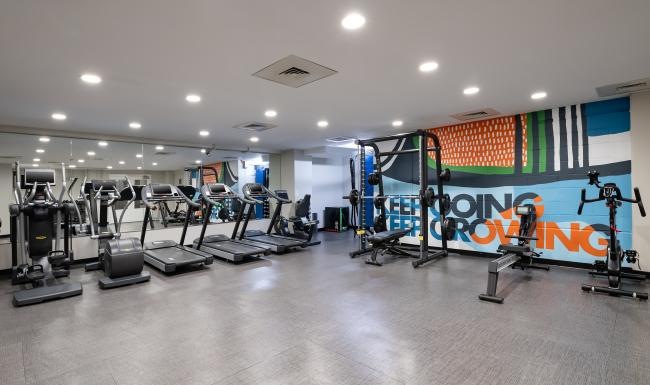 Get your workout on a gym with exercise equipment